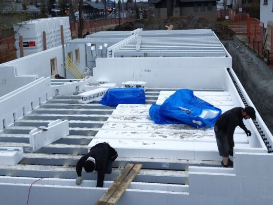 ICF installers building ICF basement with ICF blocks