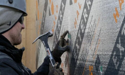 Installing exterior insulation on ICF build